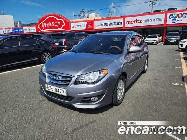 HYUNDAI AVANTE HYBRID 2012 — 176 760 км, серебристо-серый, Корея — под ключ — фото 1