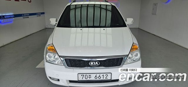 KIA CARNIVAL R 2013 — 319 950 км, белый, Корея — под ключ — фото 1