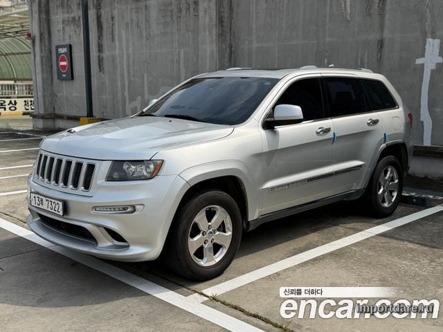 JEEP GRAND CHEROKEE 2012 — 271 622 км, серебристо-серый, Корея — под ключ — фото 1