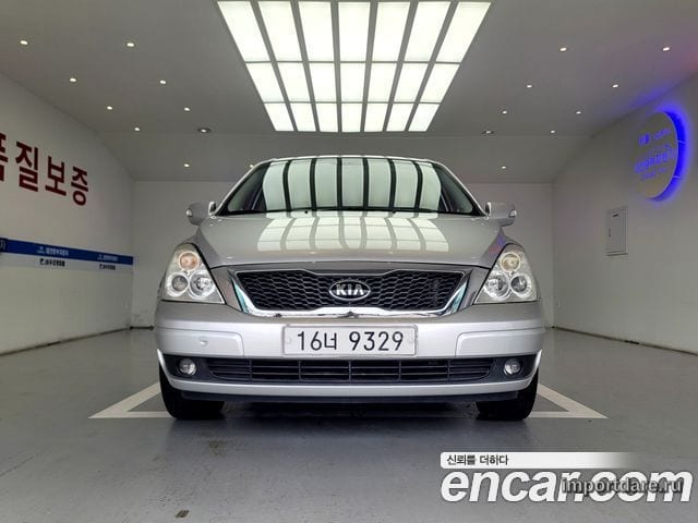 KIA CARNIVAL R 2012 — 249 000 км, серебристый, Корея — под ключ — фото 1