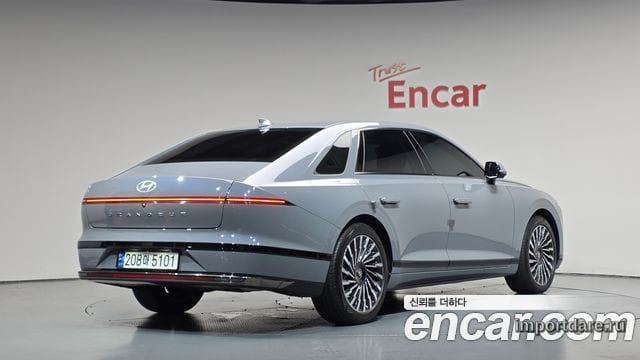 HYUNDAI GRANDEUR HYBRID 2023 — 10 208 км, серебристо-серый, Корея — под ключ — фото 1