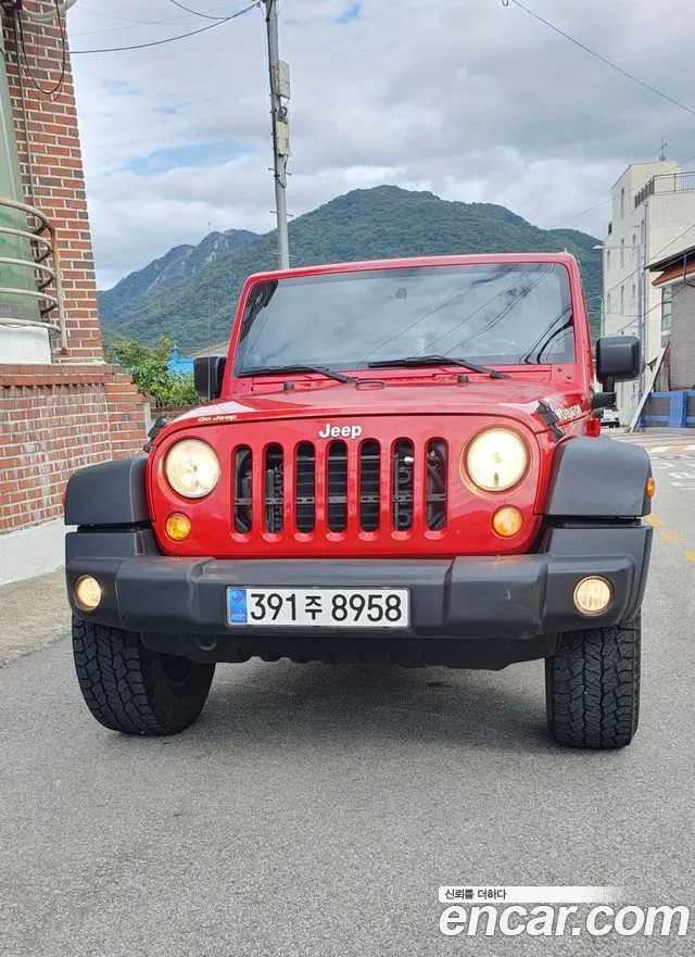 JEEP WRANGLER 2011 — 244 000 км, красный, Корея — под ключ — фото 1