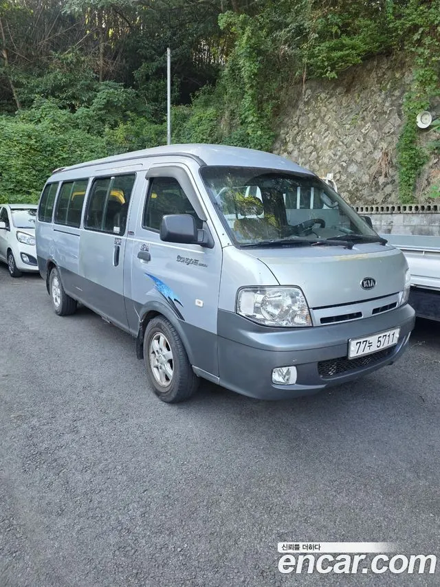 KIA BONGO III 2005 — 240 000 км, серебристо-серый, Корея — под ключ — фото 1